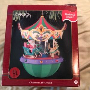 Carlton Cards musical Santa Merry-go-Round/ plays Santa Claus is Coming to Town